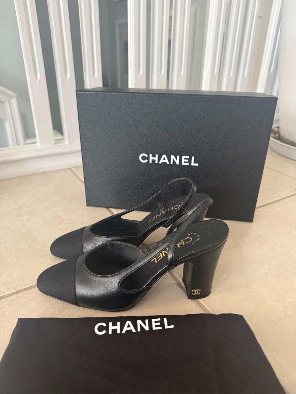 CHANEL Black Leather Slingback Heels with Gold CC Heel Accent